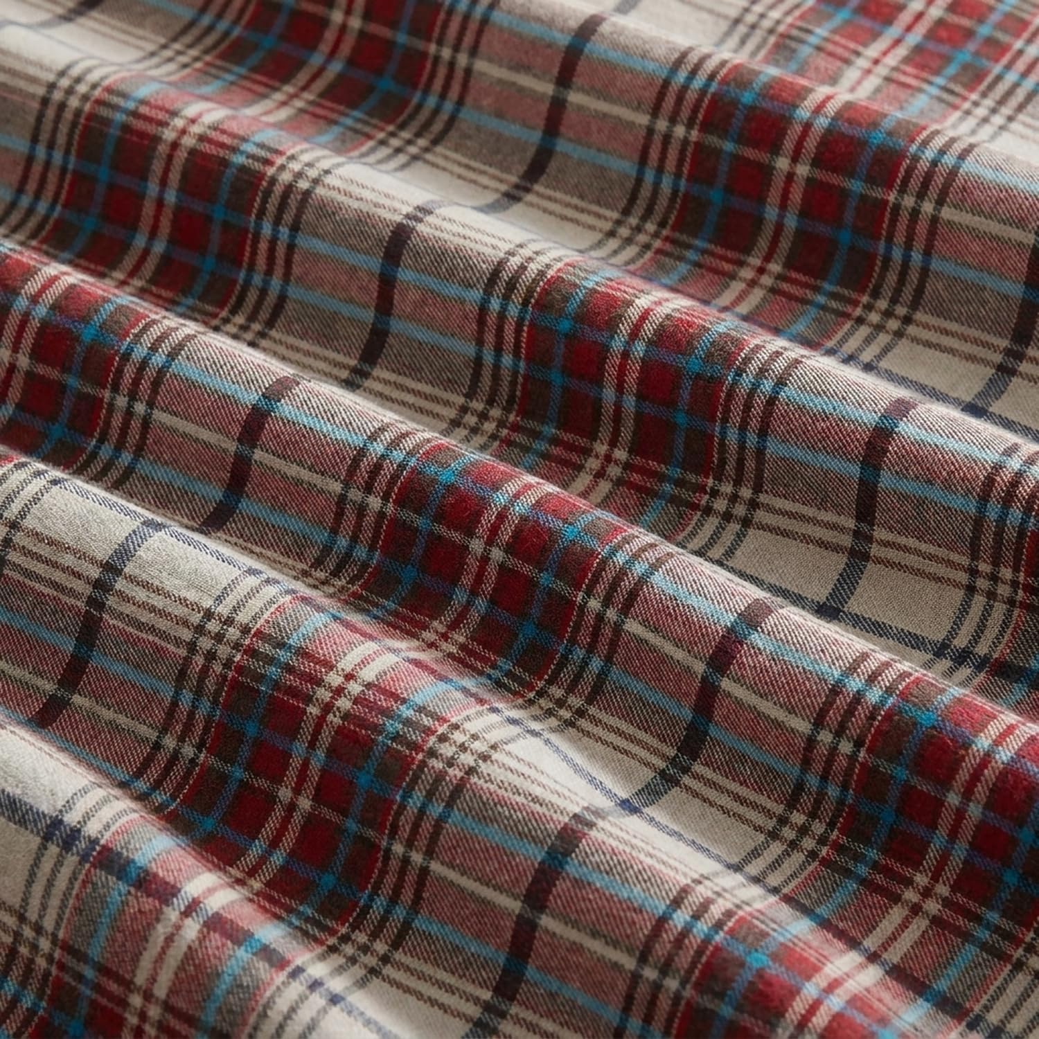 Eddie Bauer styled bedroom with Montlake Plaid red sheets adding cozy rustic warmth