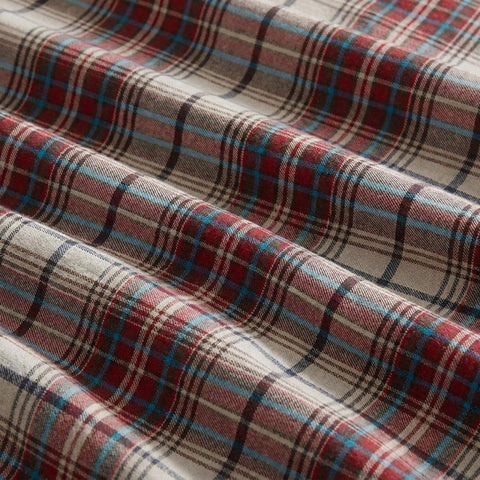 Eddie Bauer styled bedroom with Montlake Plaid red sheets adding cozy rustic warmth