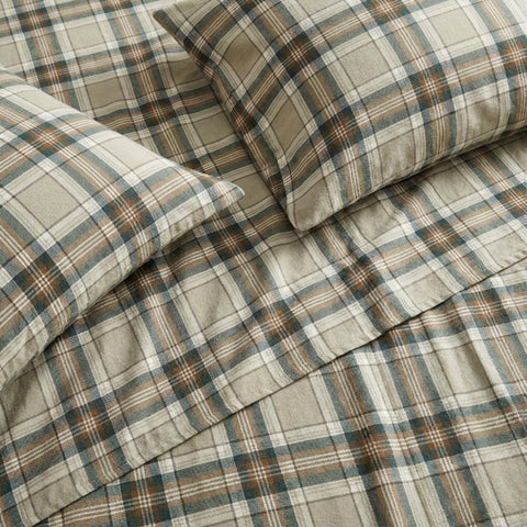 Eddie Bauer macro of brushed flannel surface showing soft texture and cozy warmth benefit