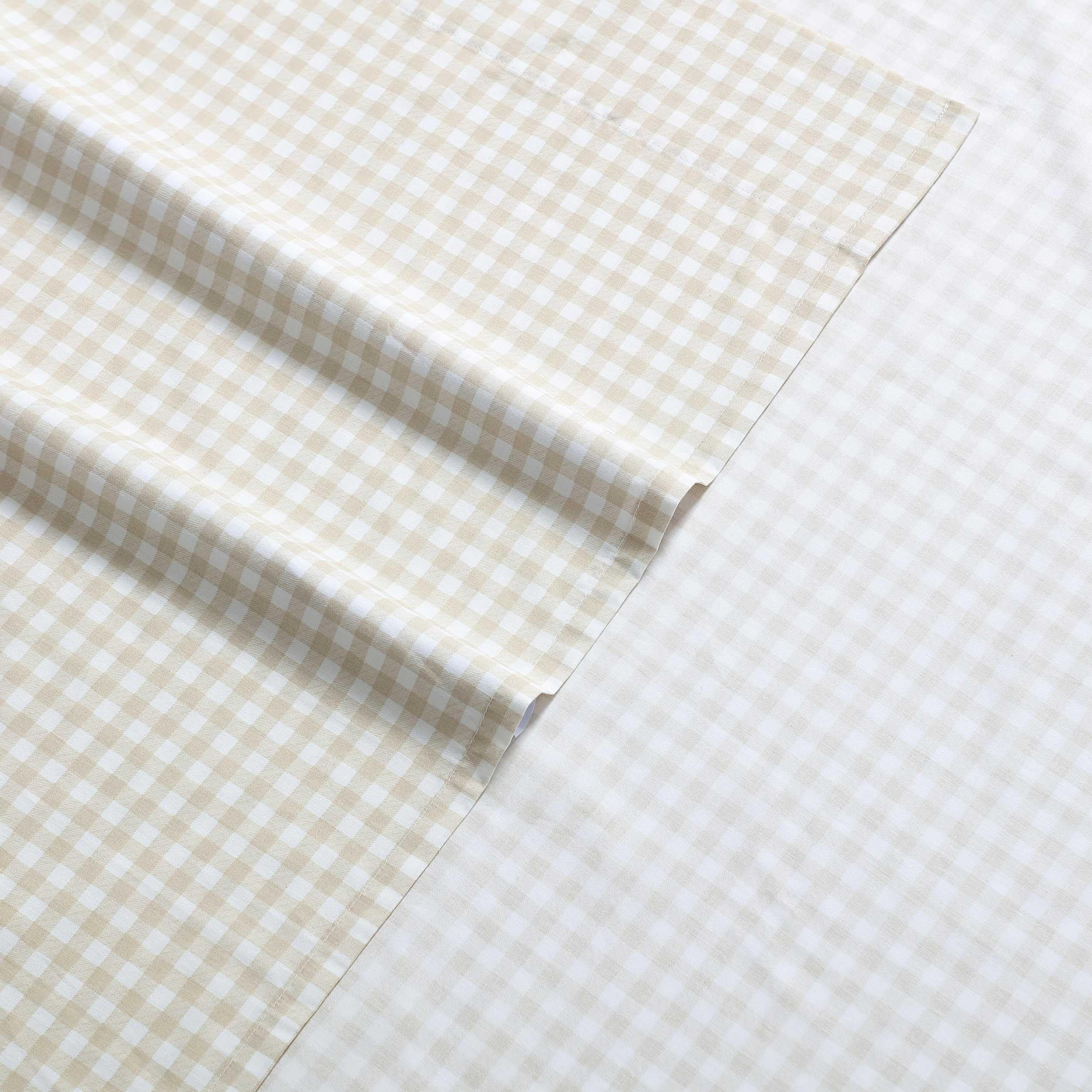 Eddie Bauer fitted sheet corner with elastic demonstrating secure mattress fit