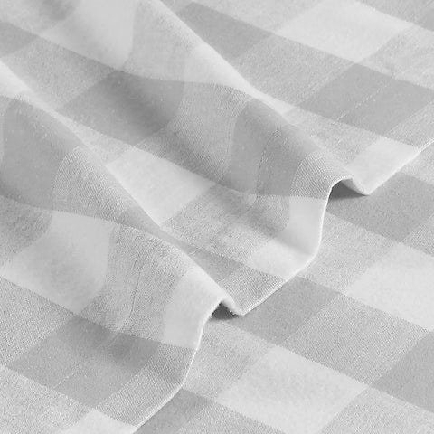 Eddie Bauer flannel texture macro shot reveals brushed nap for long-lasting warmth