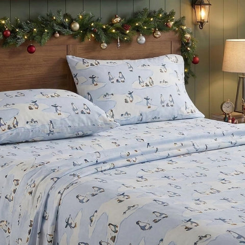 Eddie Bauer flat sheet and matching pillowcases laid flat showing complete set and tidy appearance