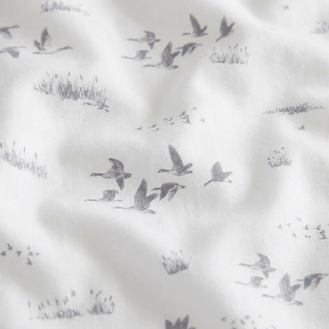 Eddie Bauer flat sheet draped over mattress showing generous drop
