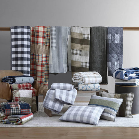 Eddie Bauer folded quilt showing loft and lightweight thickness for layering