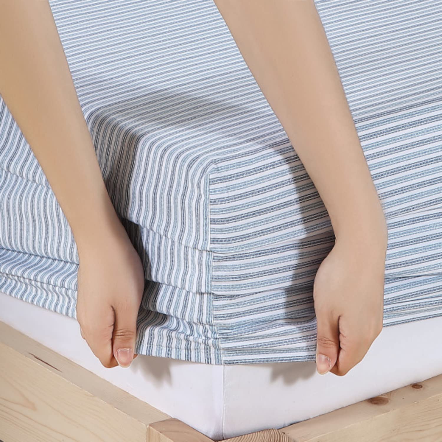 Eddie Bauer folded sheet set on shelf showing compact storage convenience