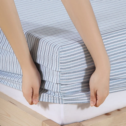 Eddie Bauer folded sheet set on shelf showing compact storage convenience