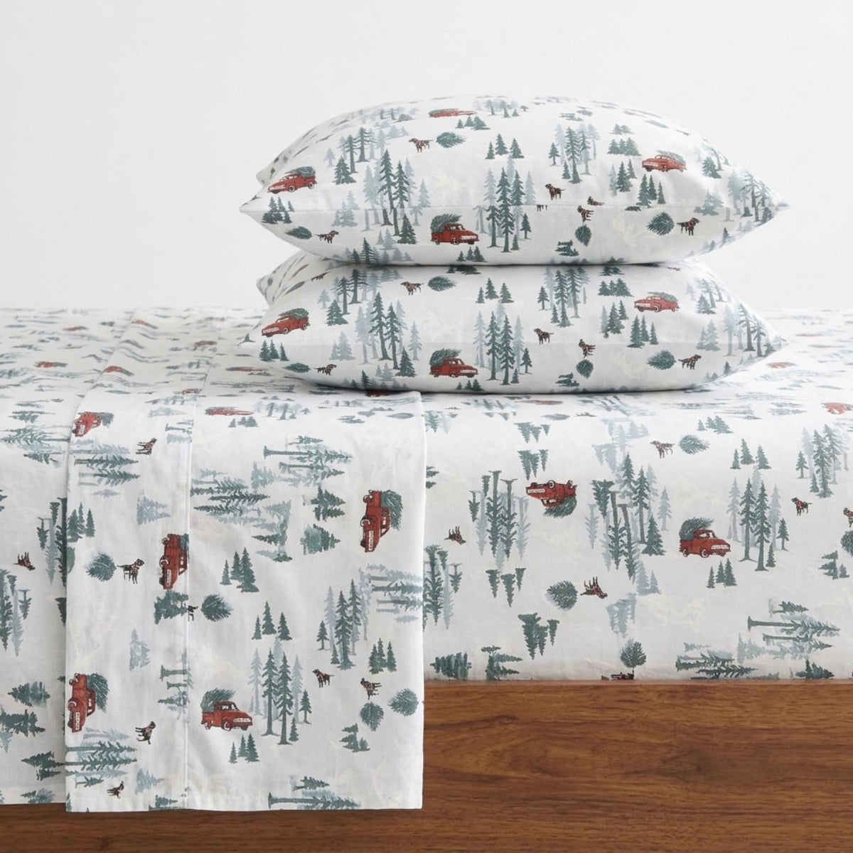 Eddie Bauer front view of Tree Farm light blue sheet set showing pattern and packaging, adds cozy style