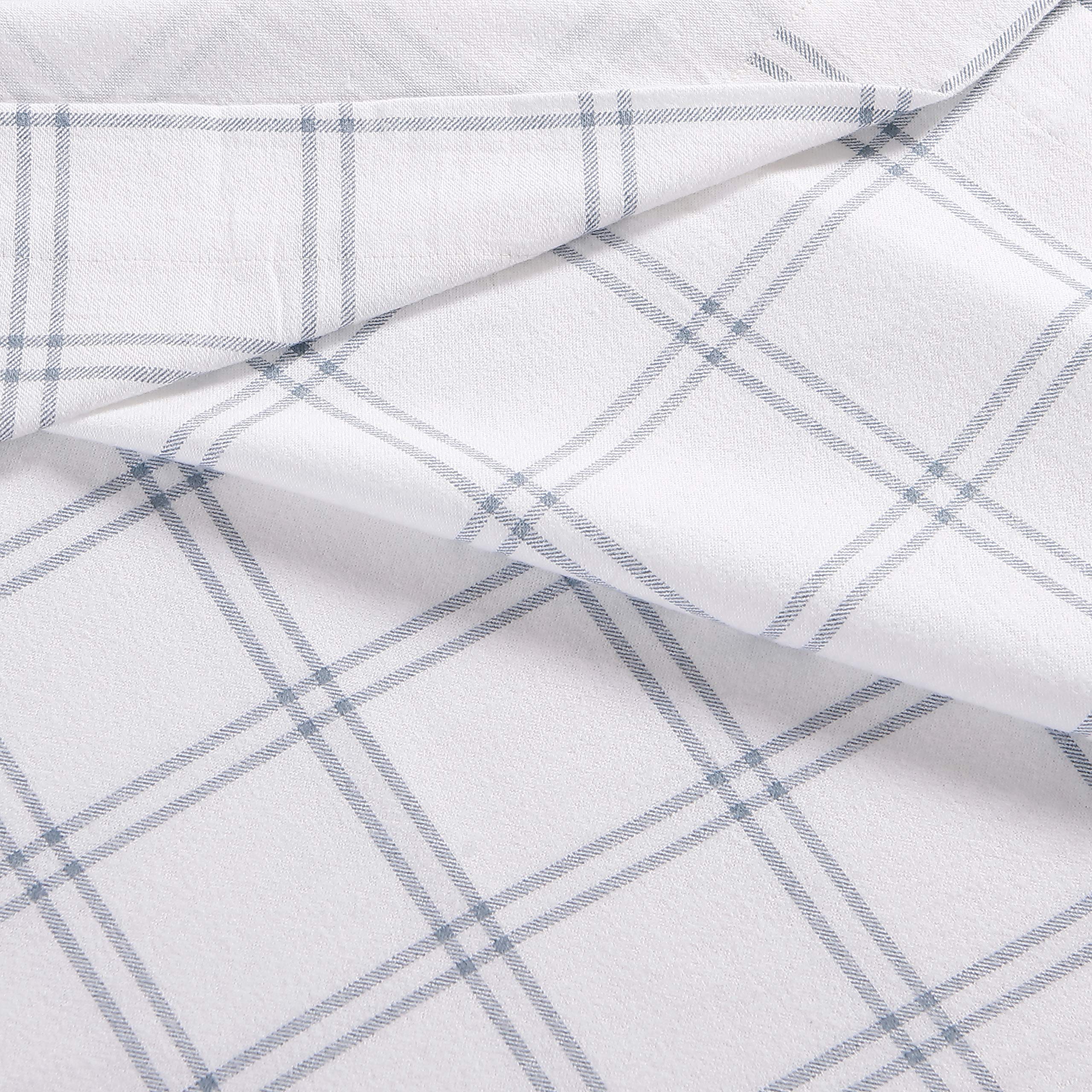 Eddie Bauer label and plaid pattern close view showing authentic brand and durable finish