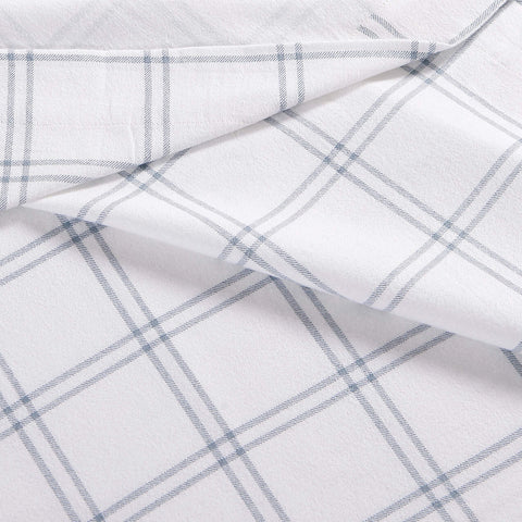 Eddie Bauer label and plaid pattern close view showing authentic brand and durable finish