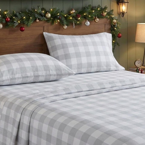 Eddie Bauer pillows and flat sheet layout highlights generous measurements and neat tuck