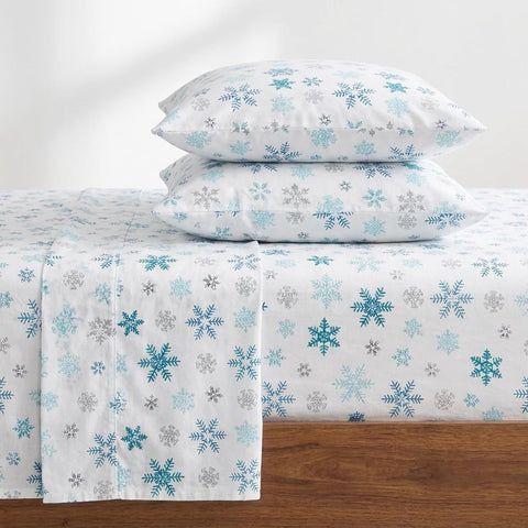 Eddie Bauer front view of queen flannel sheet set showing packaging and pattern, highlights quality