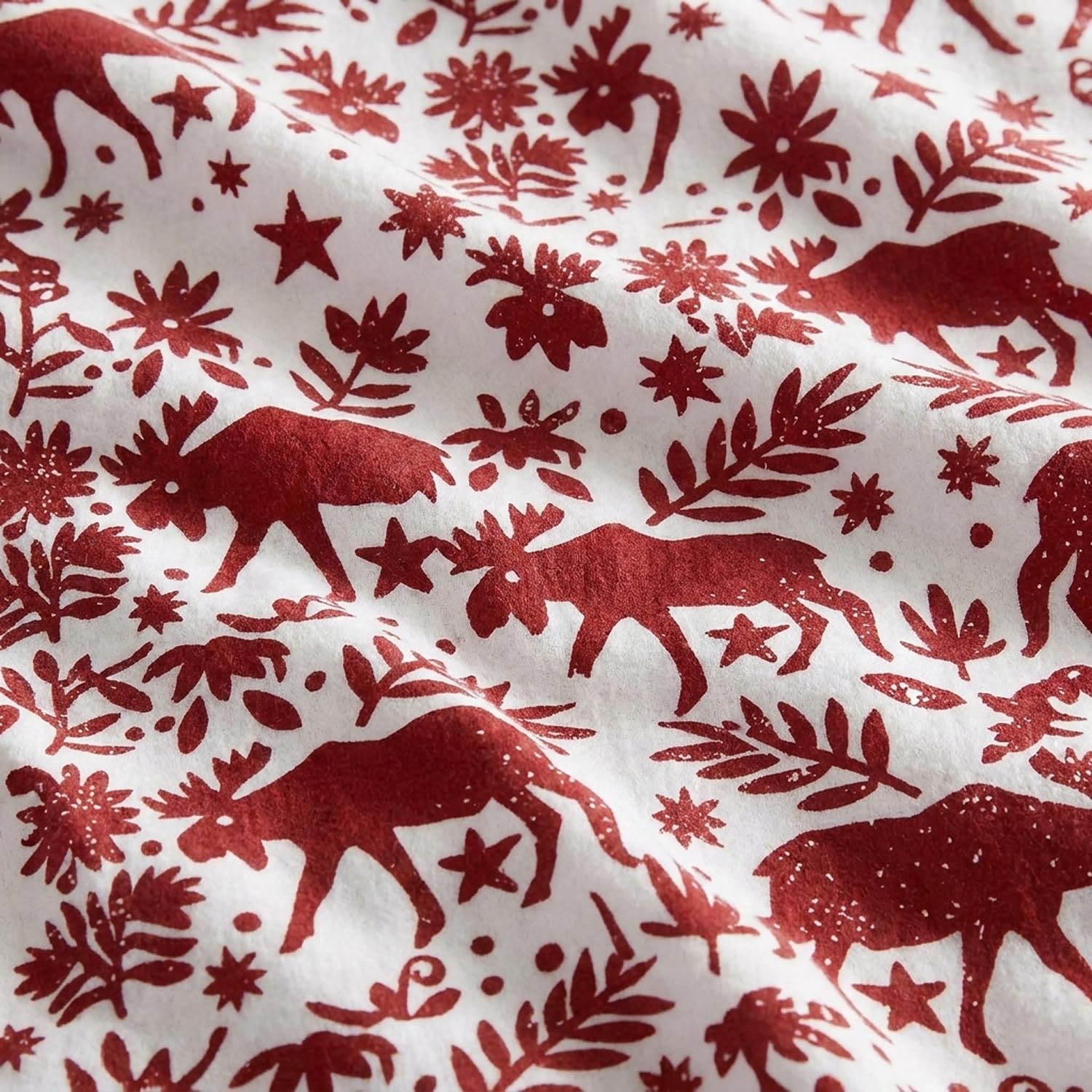 Eddie Bauer sheets on styled mattress demonstrating smooth fit and bedroom appeal