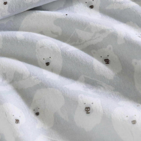 Eddie Bauer sheets styled on a made bed conveying cozy bedroom warmth
