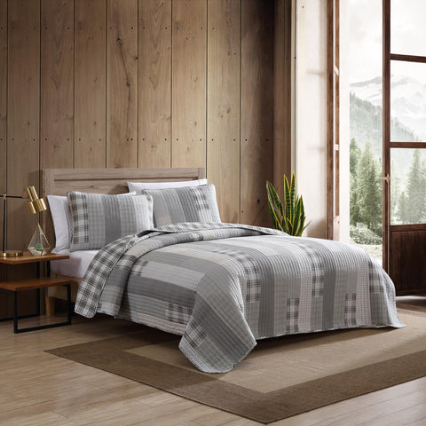 Eddie Bauer quilt on queen bed showing size coverage and fit for reference