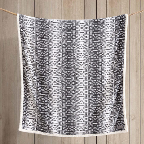Eddie Bauer folded throw demonstrating packable travel convenience