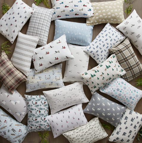 Eddie Bauer hand pressing fabric to show plush nap and touchable softness