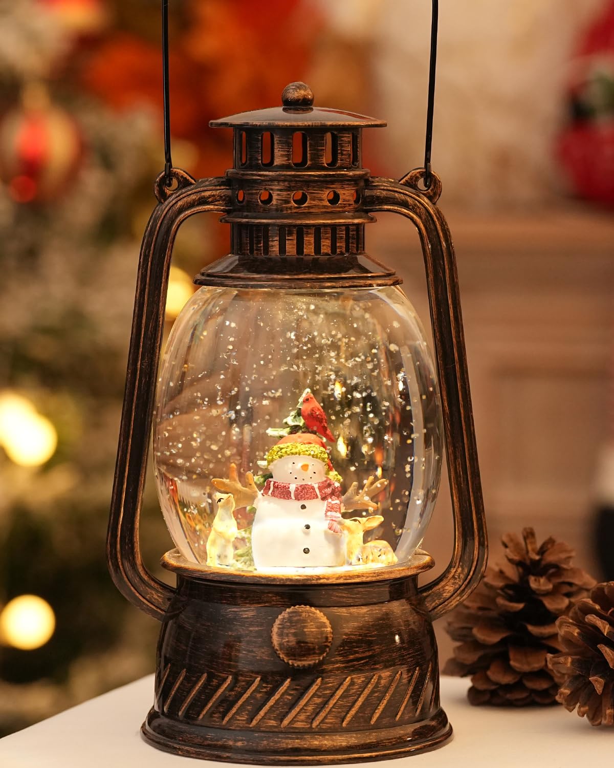 EDDORUNNING lantern front view showing snowman scene and warm glow benefit
