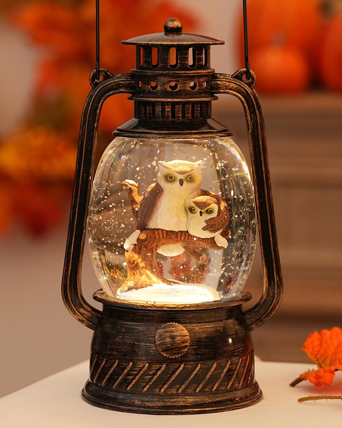 EDDORUNNING front view snow globe lantern creating warm holiday ambiance