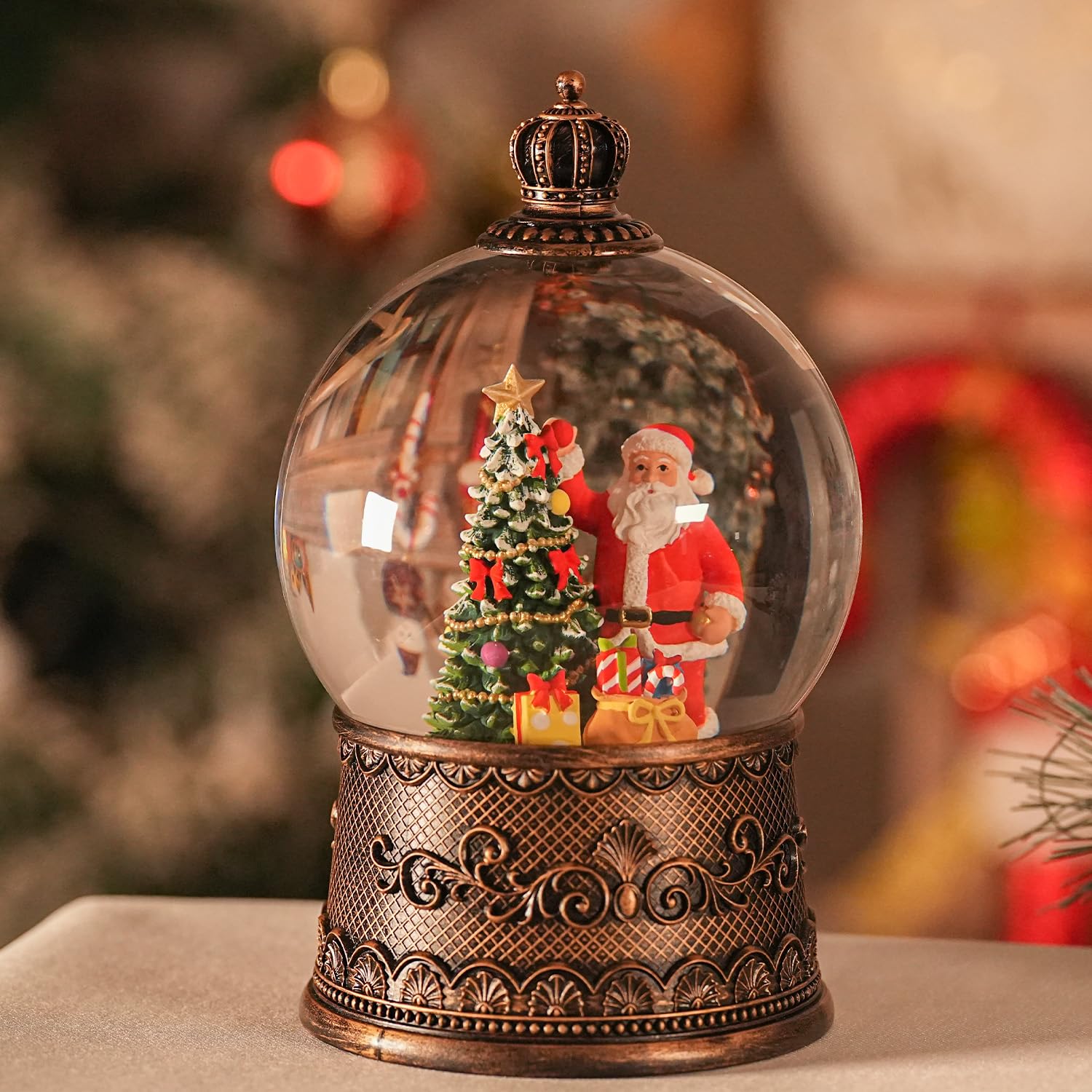 EDDORUNNING front view of snow globe showing Santa and glowing base warming a room