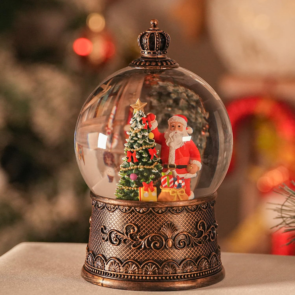 EDDORUNNING front view of snow globe showing Santa and glowing base warming a room