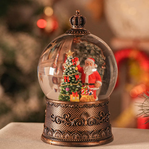 EDDORUNNING front view of snow globe showing Santa and glowing base warming a room