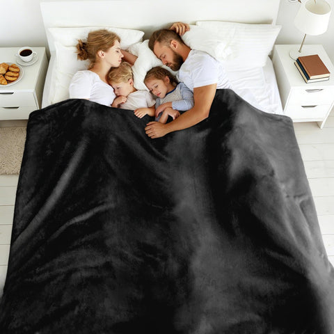 Edenleaf draped on California king bed showing roomy overhang and warmth