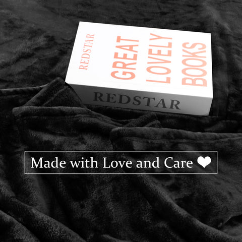 Edenleaf family on sofa sharing giant blanket for cozy togetherness