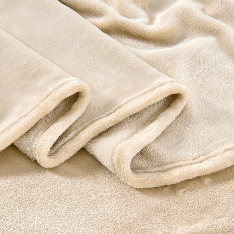 Edenleaf folded next to a pillow showing scale and easy storage convenience