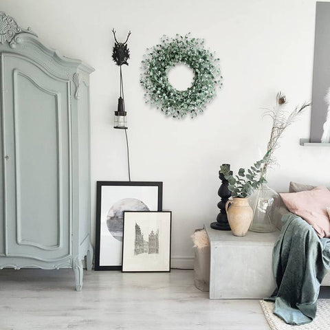 egolot wreath decorating a wedding chair, adds romantic greenery