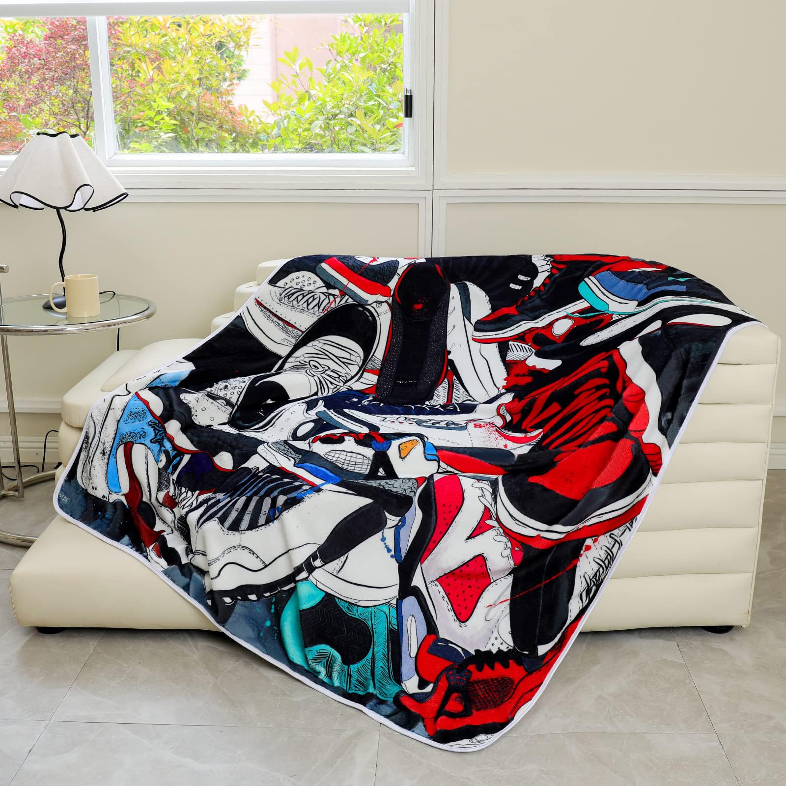 EISKBC blanket next to ruler showing 60x50 inch scale for accurate sizing
