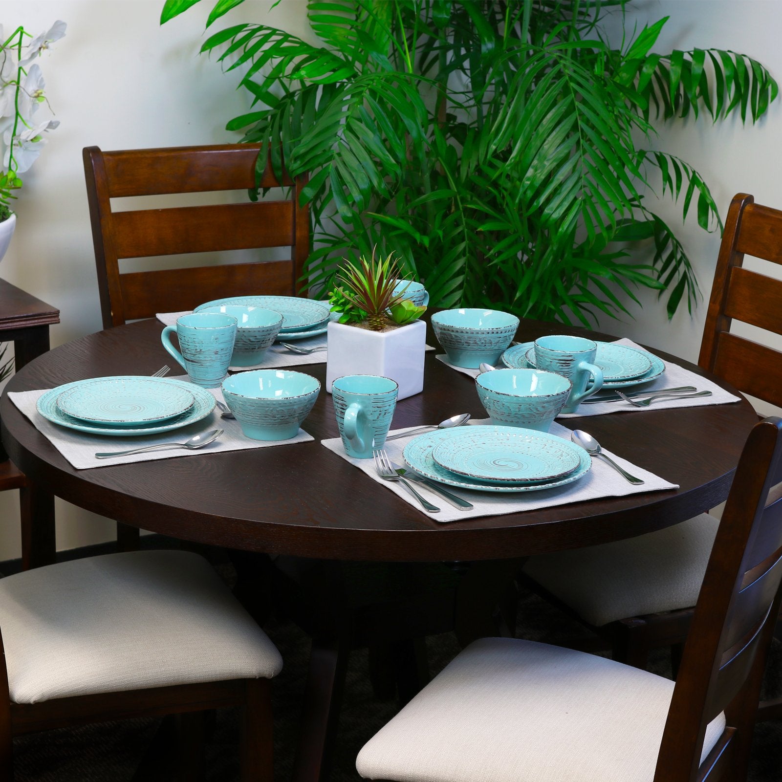 Elama table setting with linen and wood for styled coastal entertaining benefit