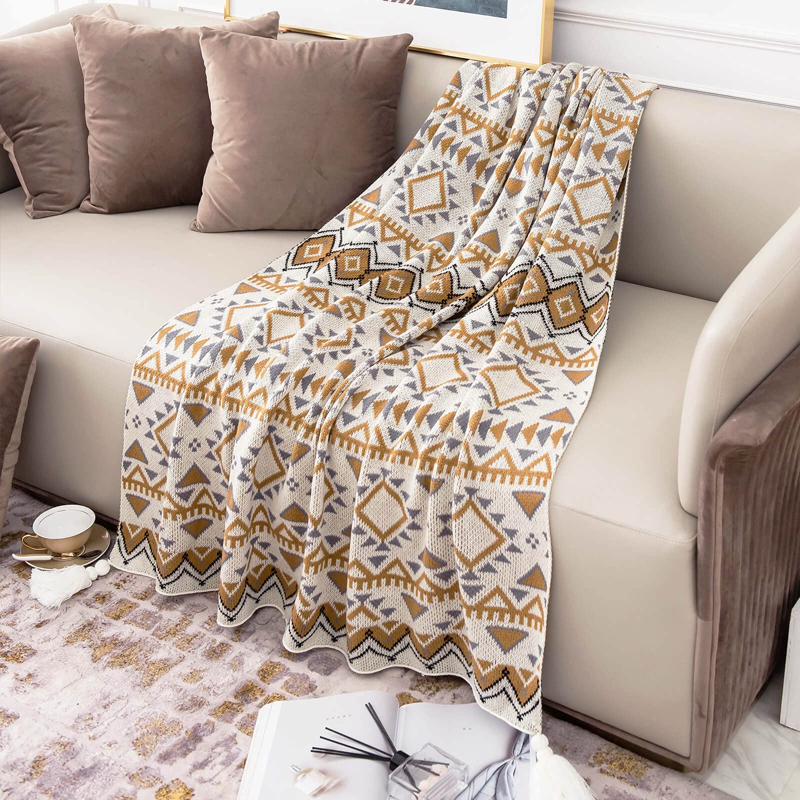 ELASAD folded on bed showing lightweight layer and styling use