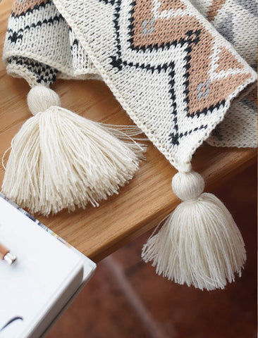 ELASAD tassel detail showing handcrafted fringe for added texture