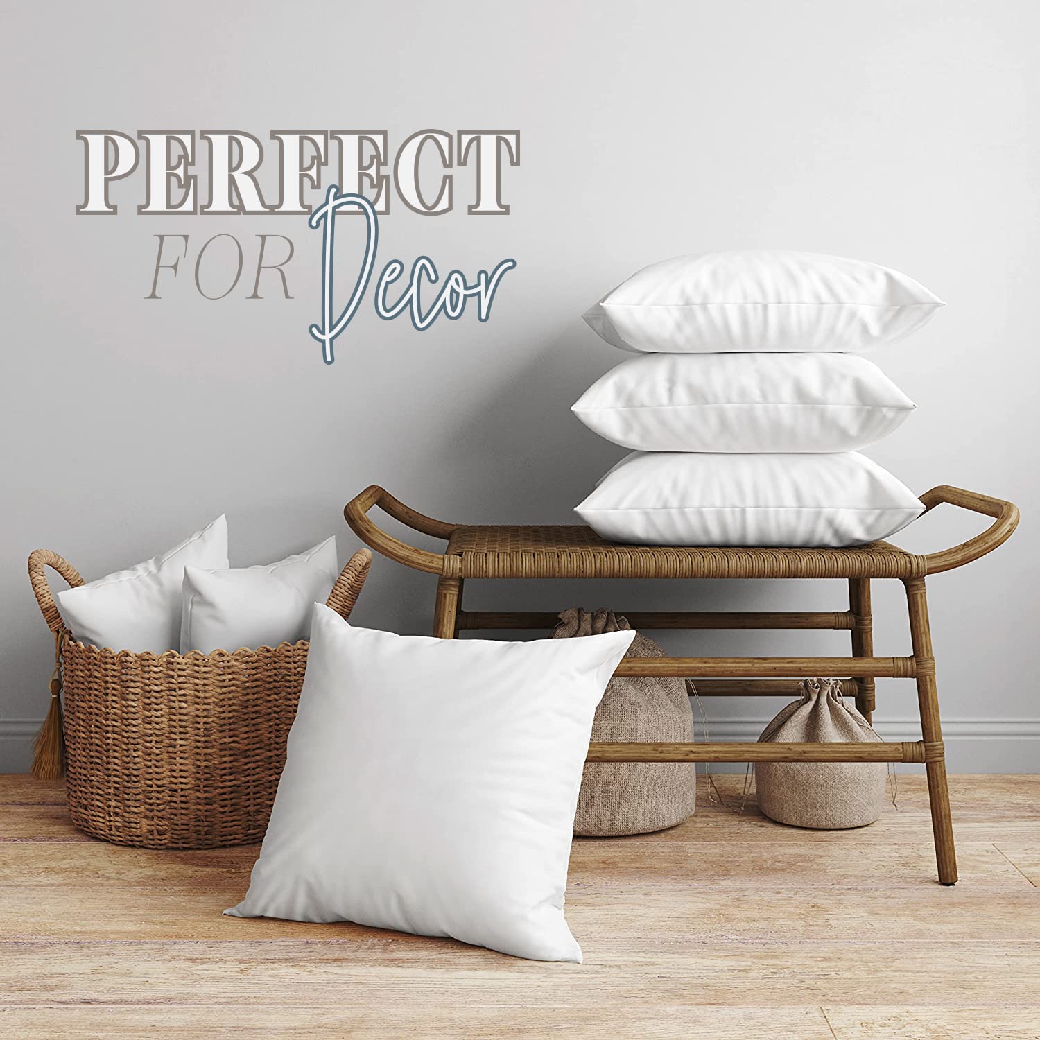 Elegant Comfort inserts arranged on a bed for layered decorative appeal