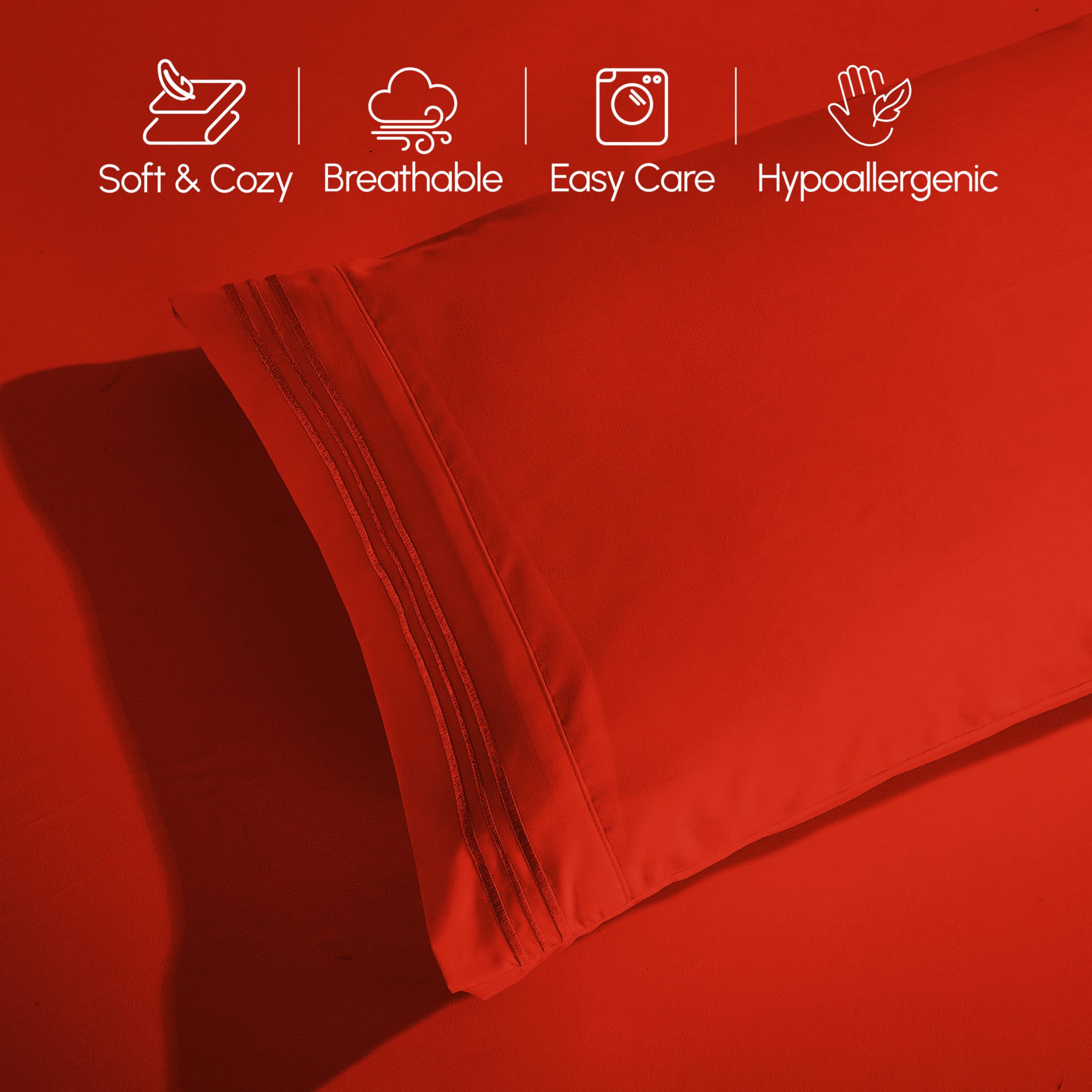 Elegant Comfort styled bedroom scene with red sheets for a hotel-quality sleep vibe