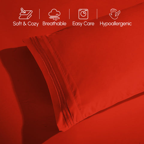Elegant Comfort styled bedroom scene with red sheets for a hotel-quality sleep vibe