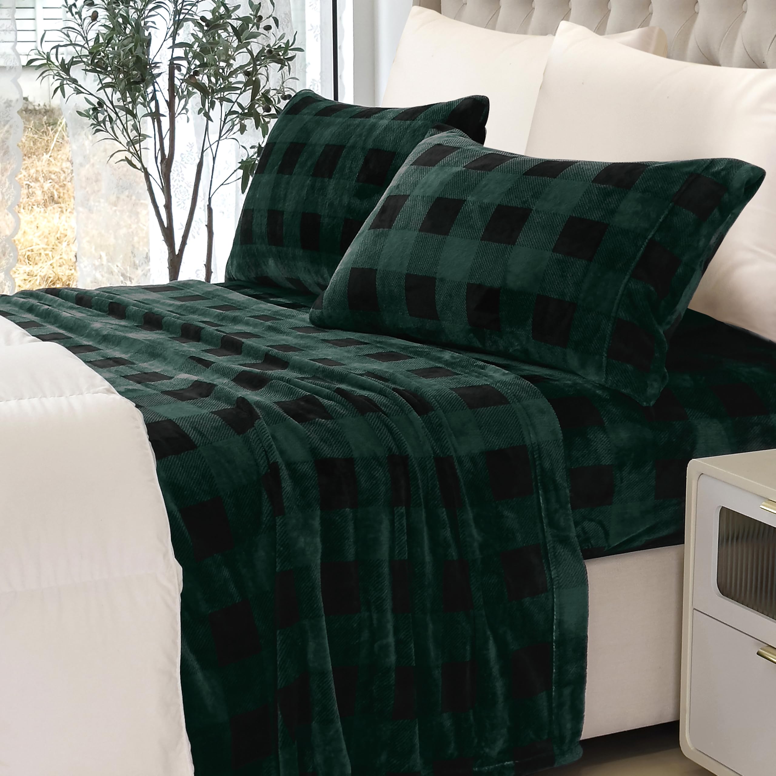 Elegant Comfort styled bedroom with sheets installed conveying warm, inviting atmosphere