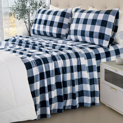 Elegant Comfort bedroom lifestyle shot showing cozy, styled bed