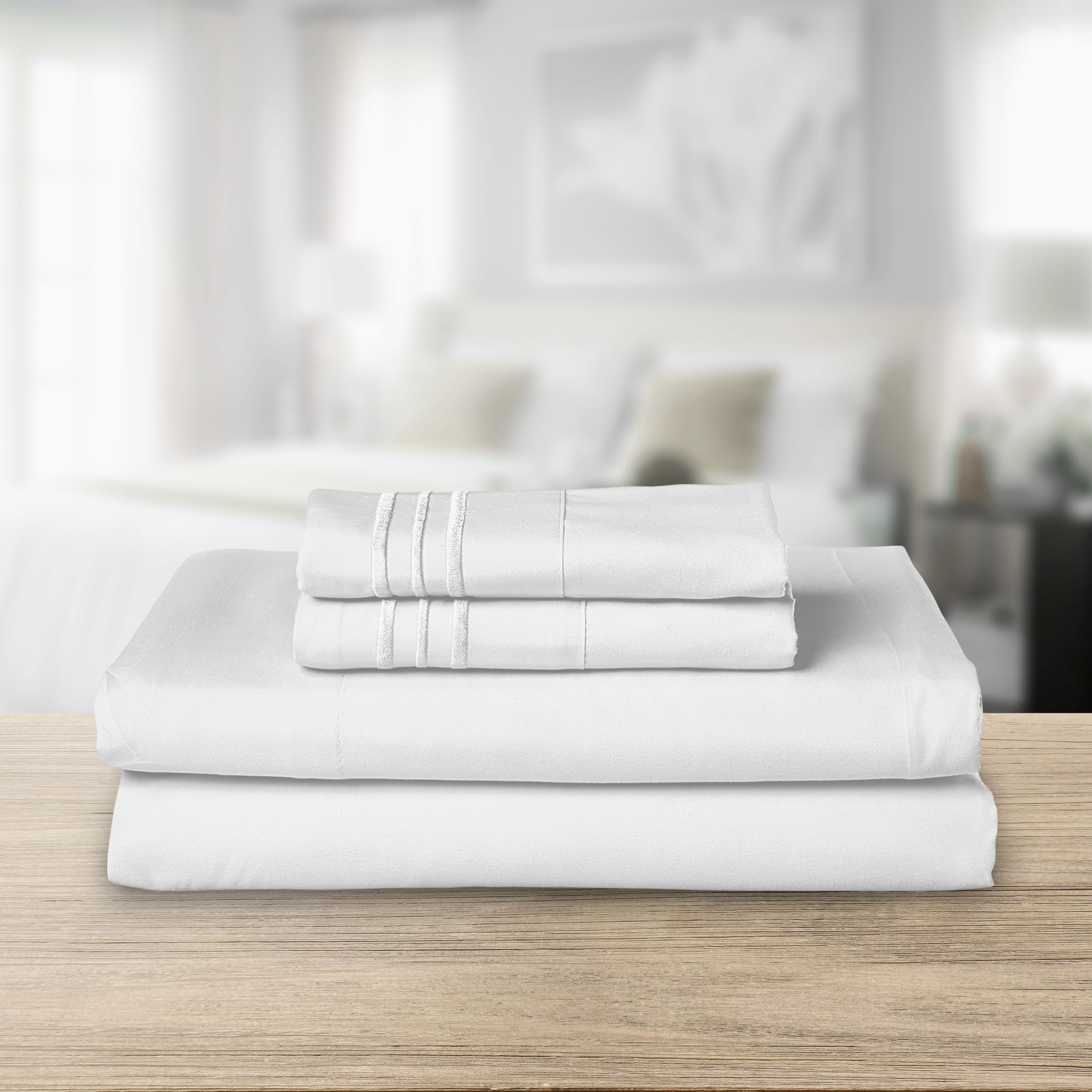 Elegant Comfort close-up of three-line embroidery on pillowcase adding refined detail