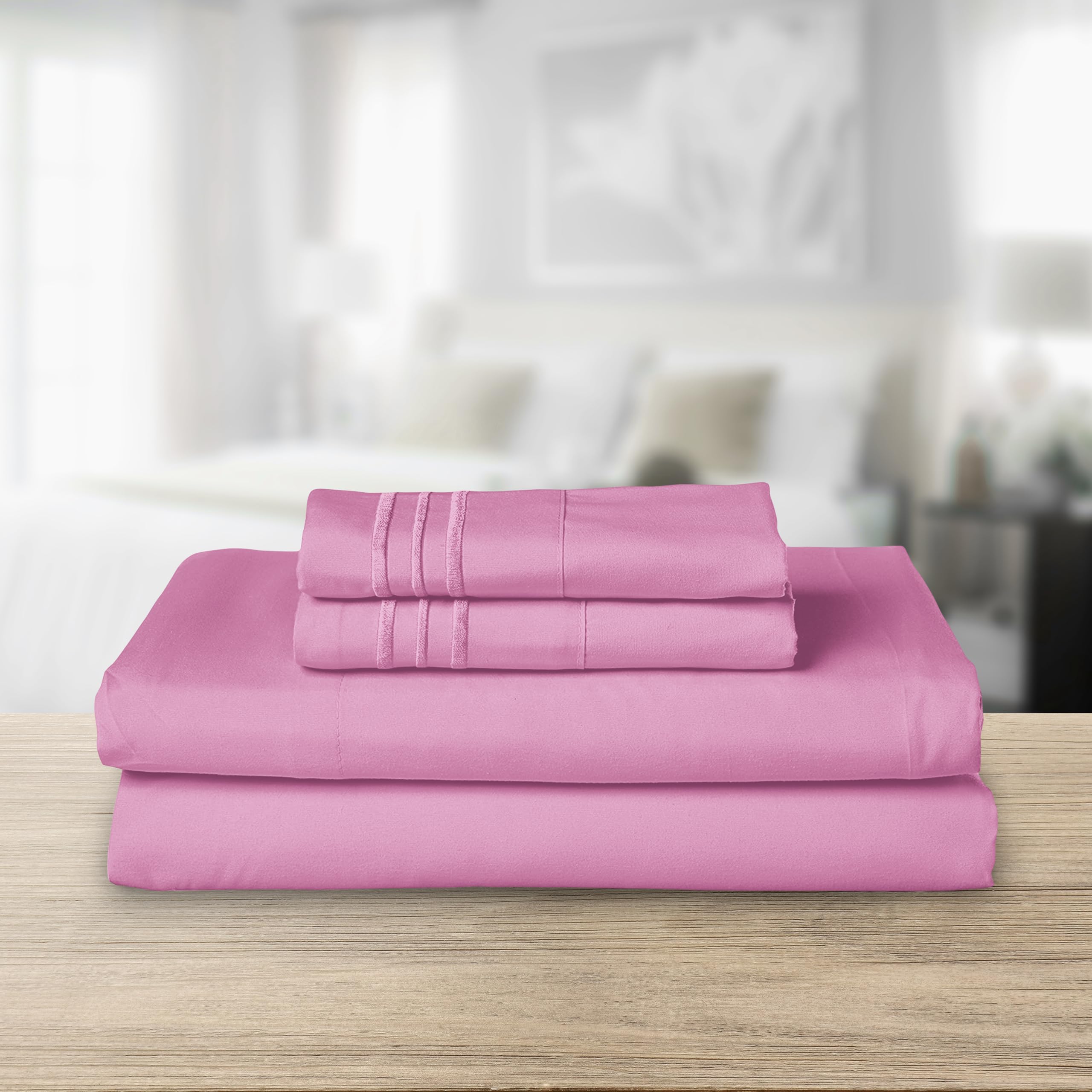 Elegant Comfort close-up of three-line embroidered pillowcase highlighting refined detail