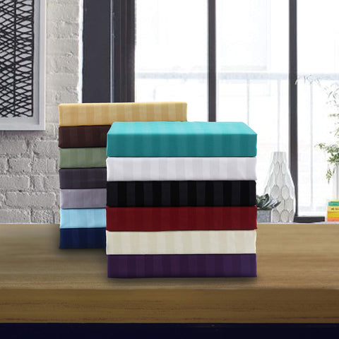 Elegant Comfort fabric held in hand illustrating silky touch and durability