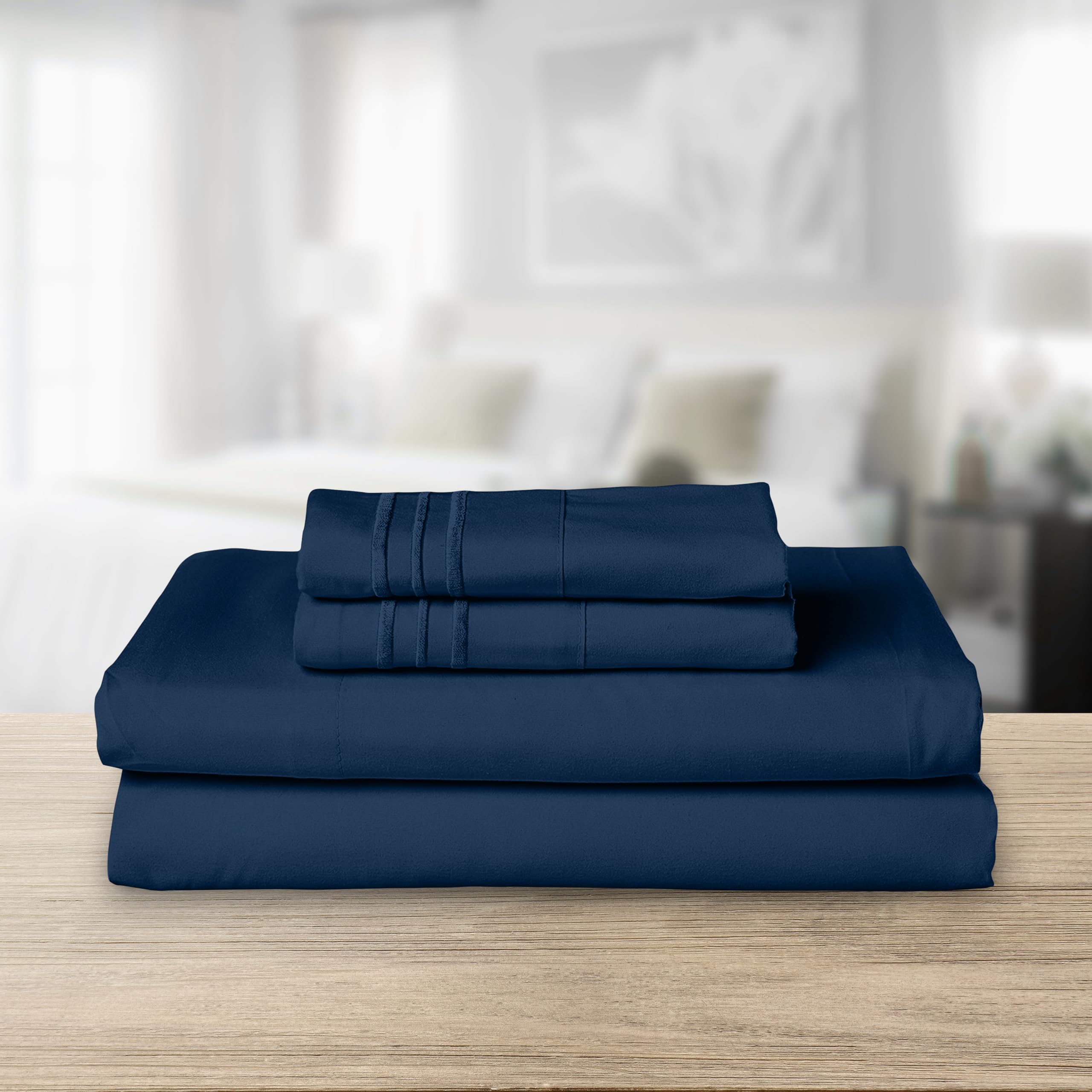 Elegant Comfort pillowcase embroidery close-up highlighting decorative lines and refined detail