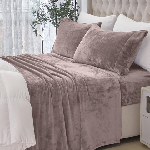 Elegant Comfort folded sheet set beside ruler, showing compact storage and set contents