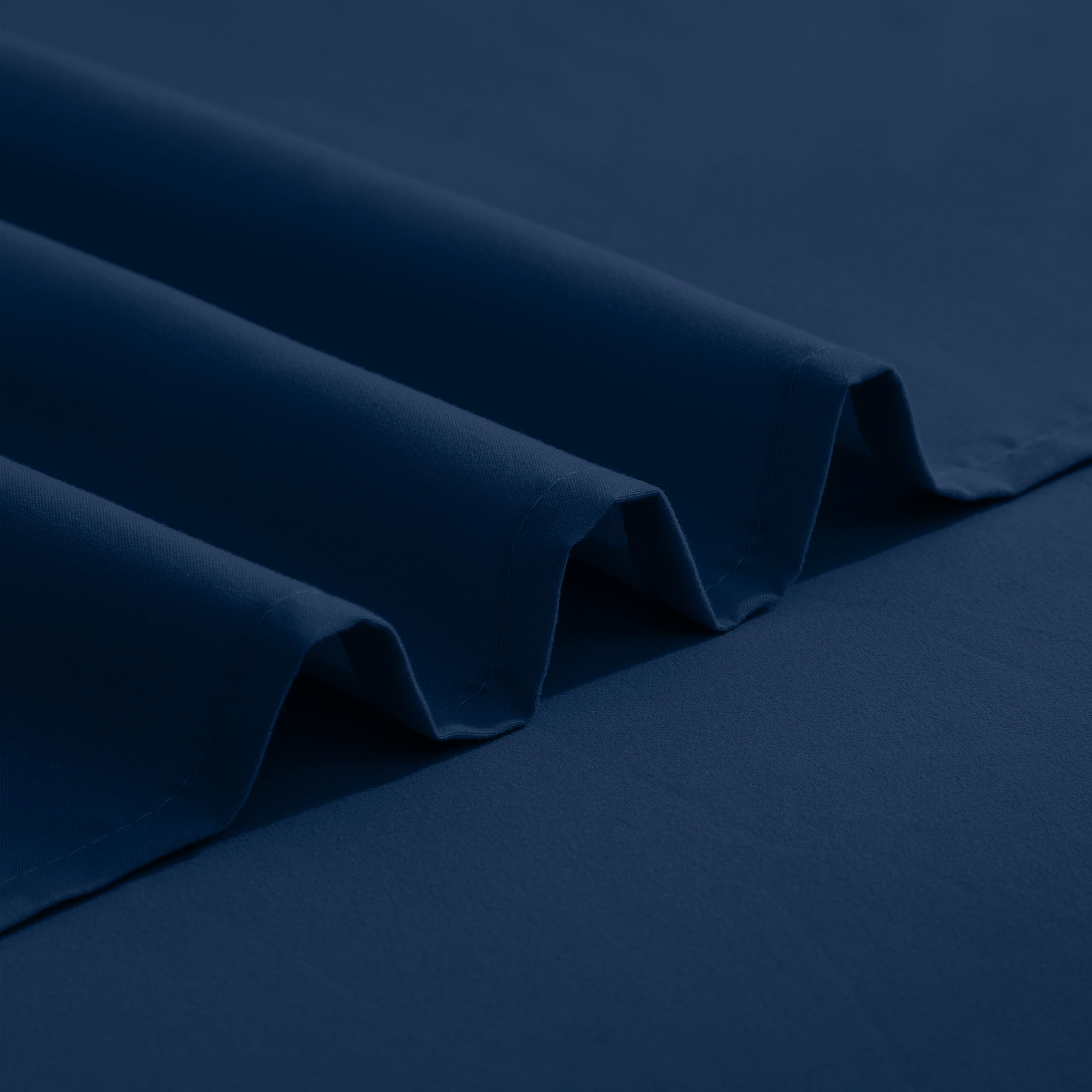 Elegant Comfort fitted sheet on mattress showing how the sheet fits up to 16-inch thickness