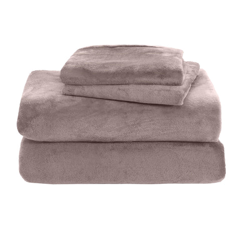 Elegant Comfort sheets styled on bed in bedroom, adding warmth and elegant taupe decor