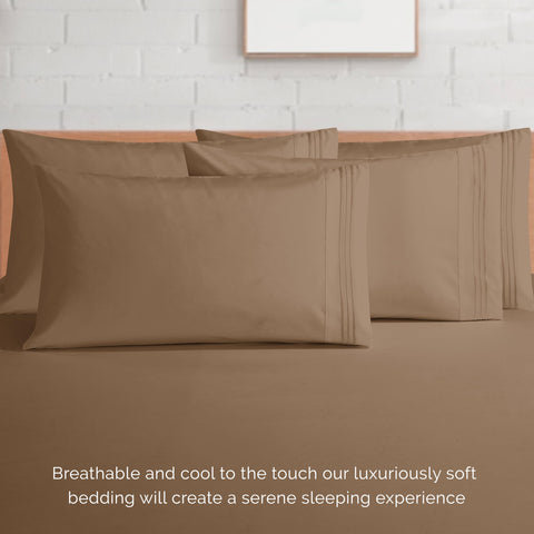 Elegant Comfort sheet set on a made queen bed illustrating hotel-style look