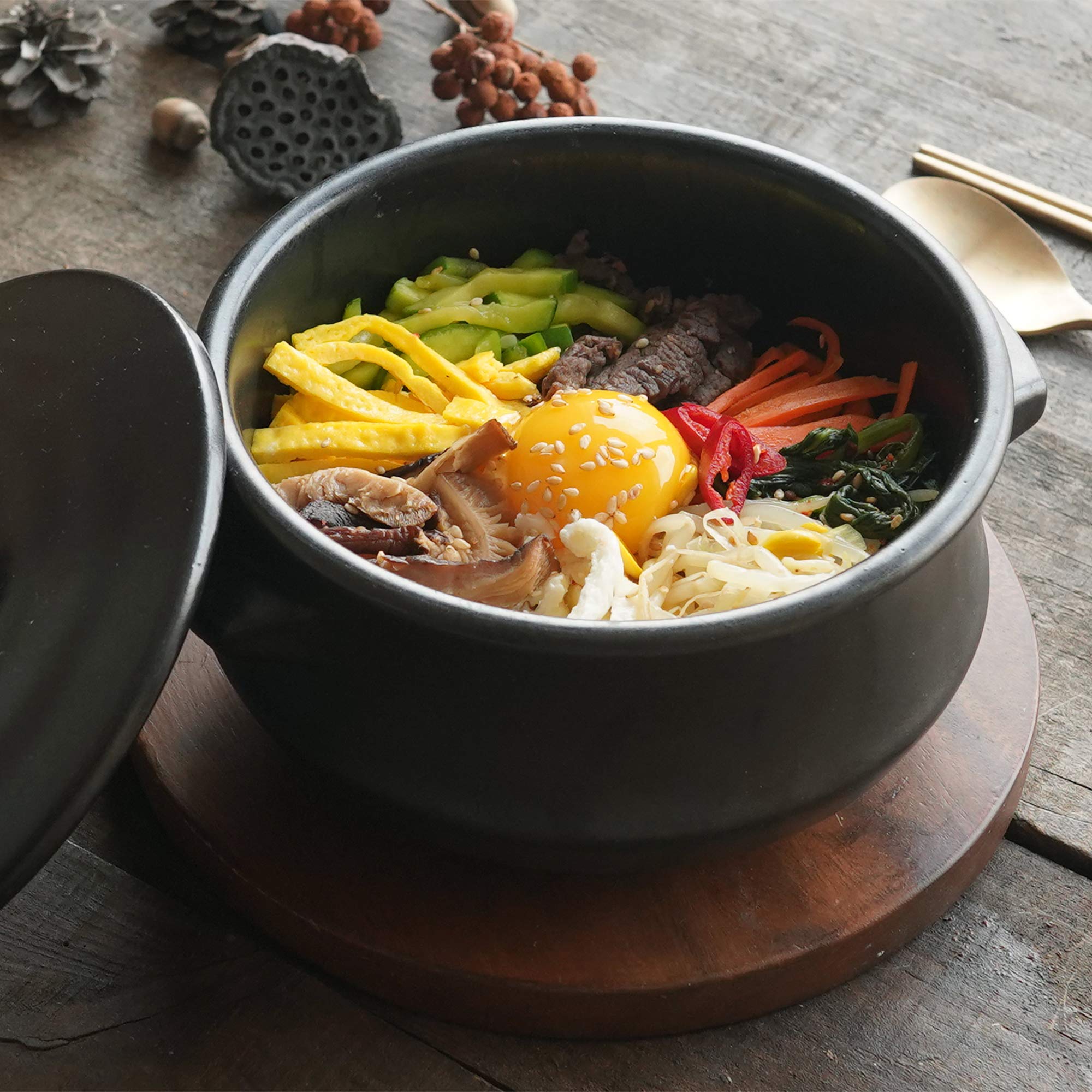 ElinCube dolsot on kitchen counter showcasing dramatic sizzling presentation