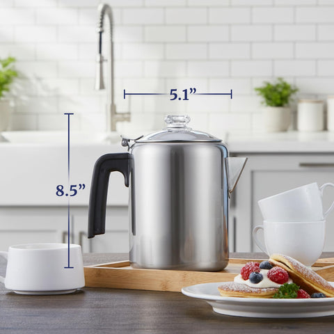 Elite Gourmet pouring hot coffee into a cup highlighting precise pour and reduced dripping