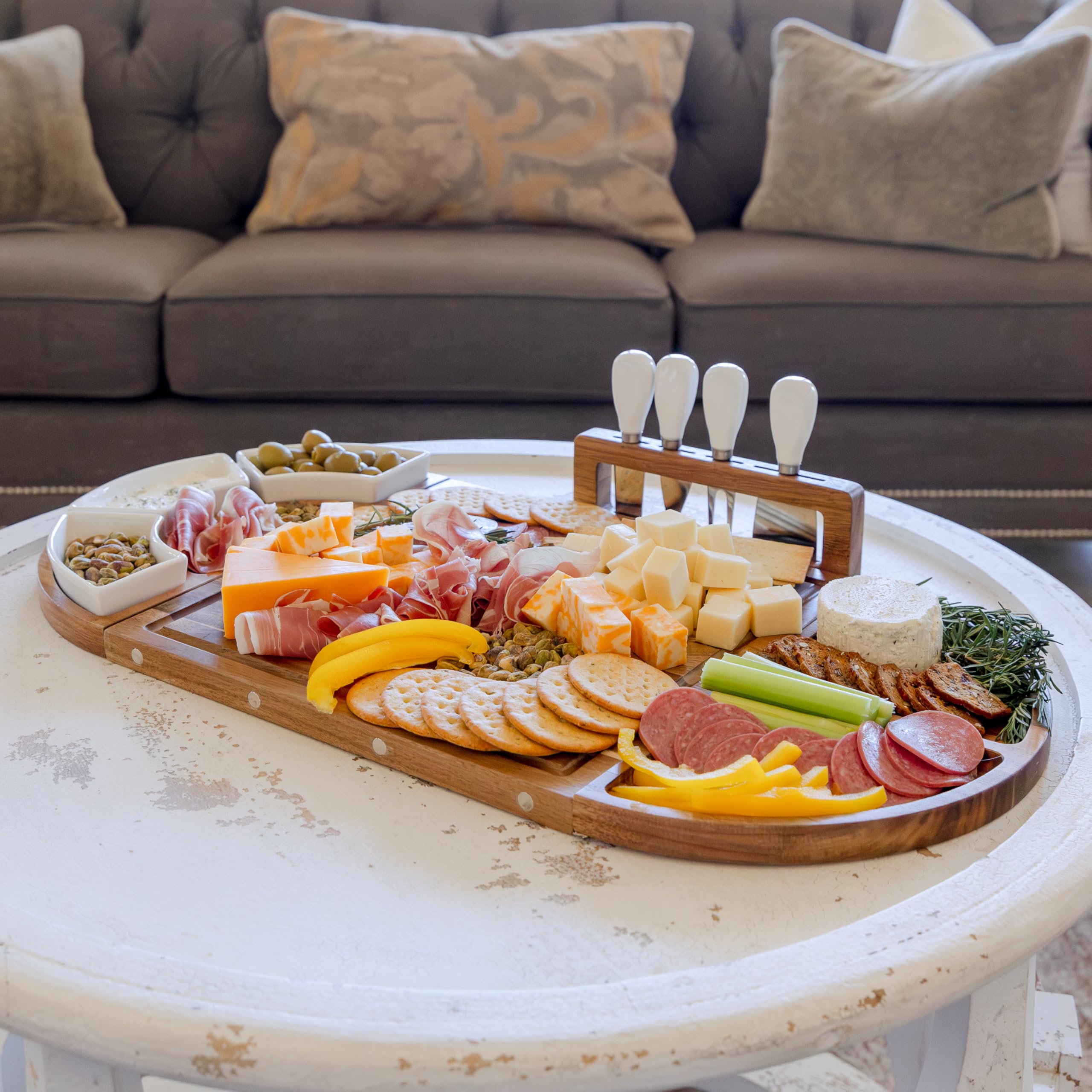 The Elite Snacker board next to a hand showing scale for portion planning