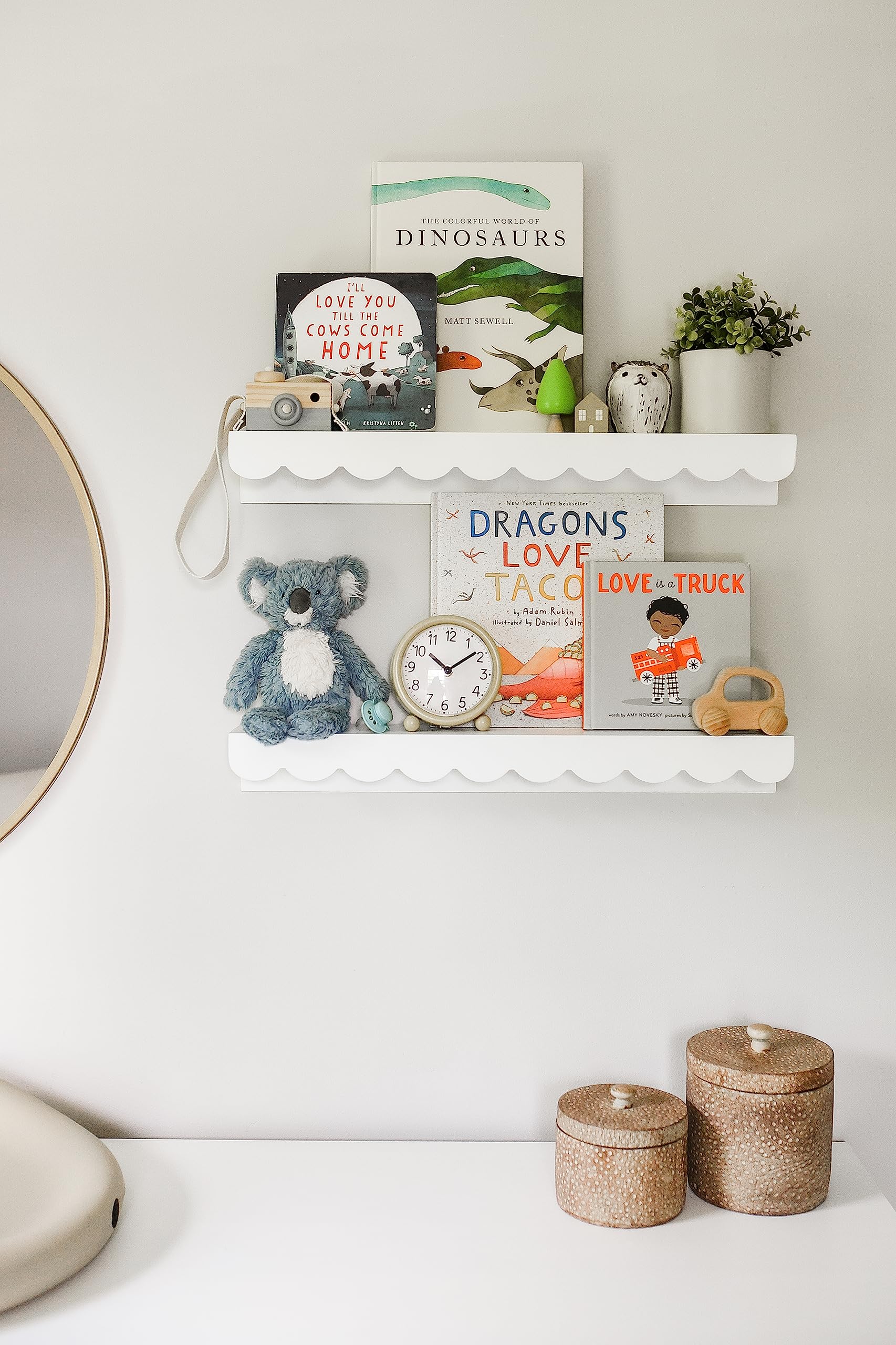 Elmwood Road shelves holding children’s books for easy access and learning